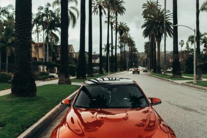 red BMW coupe parked at road